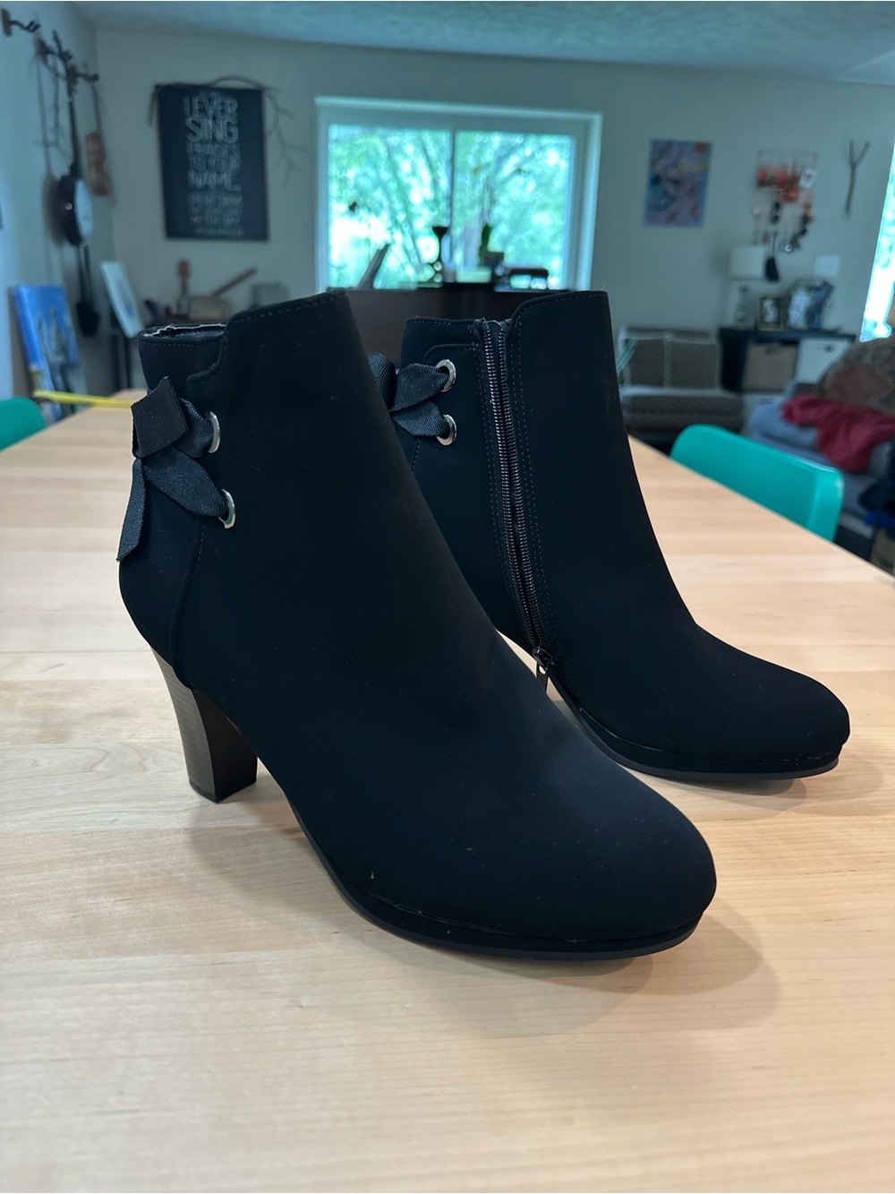 Mari. A Black Suede-Look Ankle Boots with Zipper close and Bow Accent 9